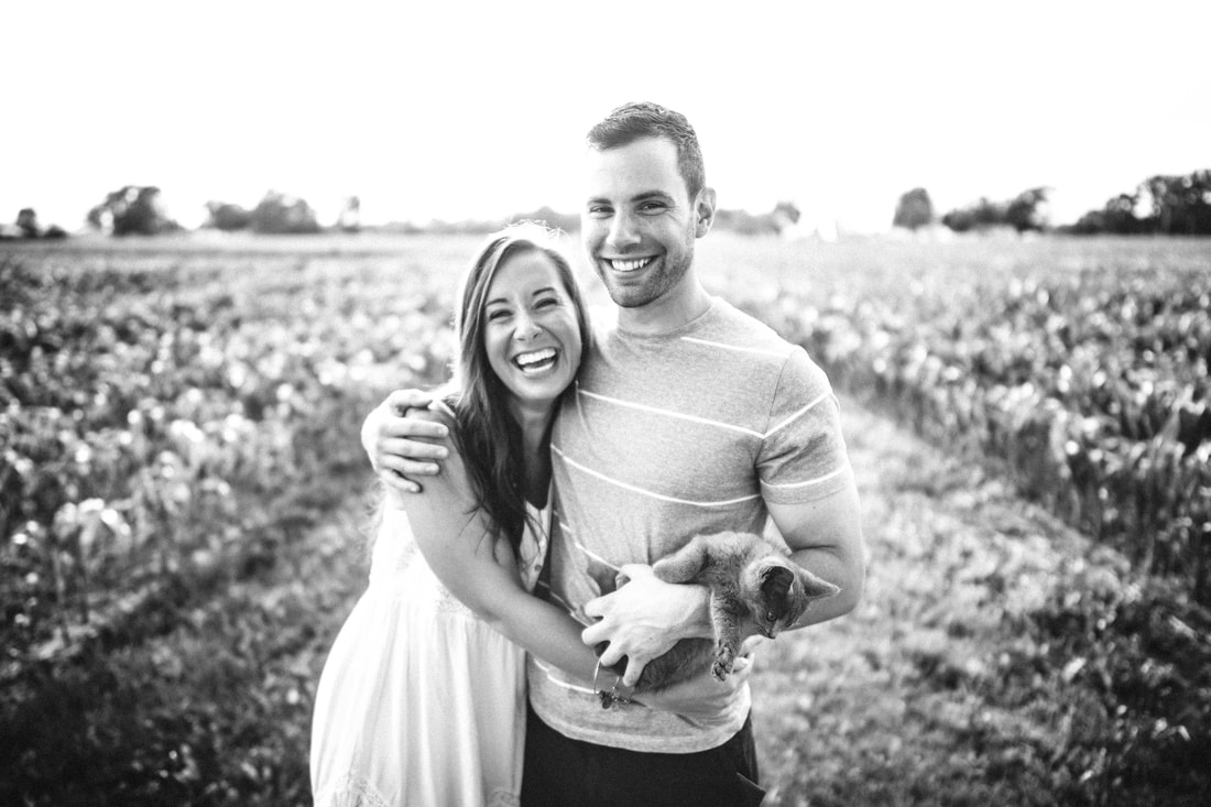 image of happy couple smiling at camera